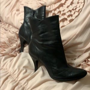 Black leather booties with 3.5 inch heel.